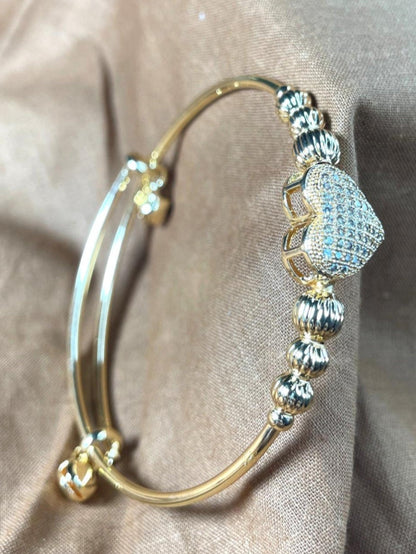 Radiant Golden Heart Bangle."Stainless Steel"